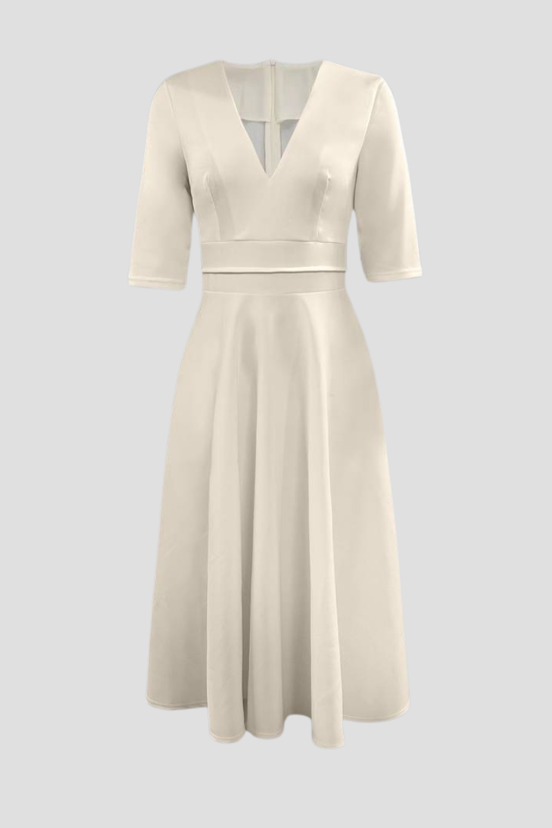 Retro 60’s swingjurk met V-hals