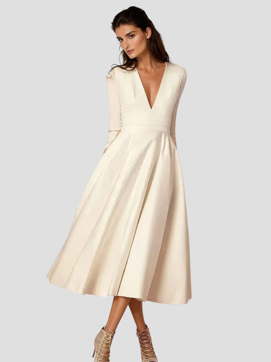 Retro 60’s swingjurk met V-hals