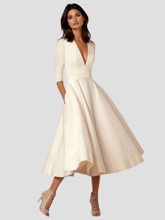 Retro 60’s swingjurk met V-hals